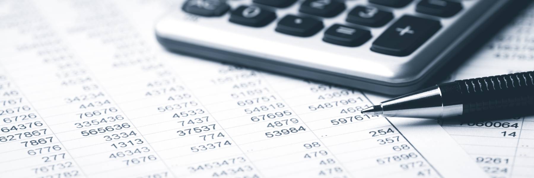 paper and calculator representing accounting