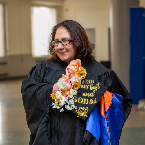 Marielly A. at commencement in Rochester.