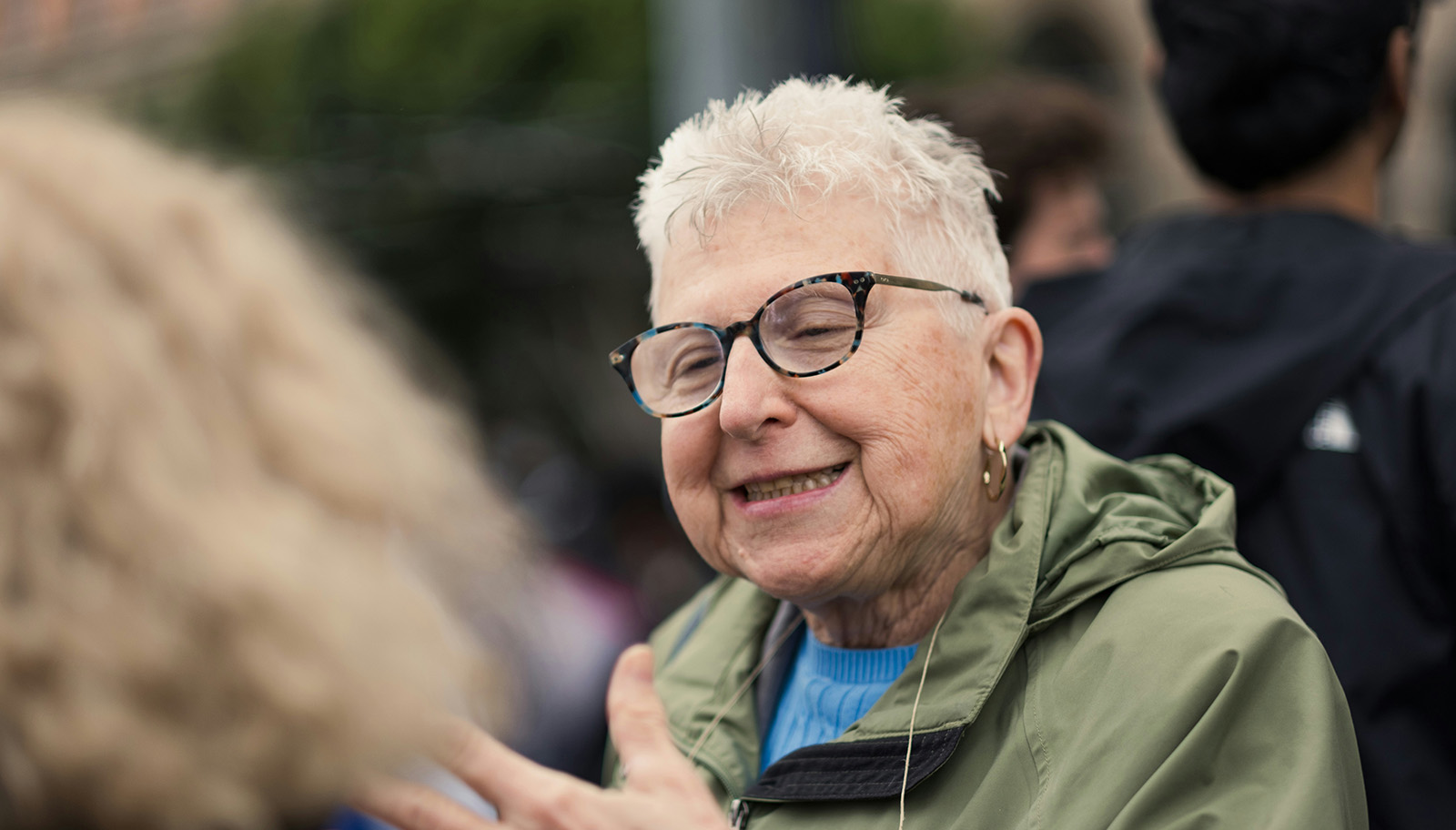 person talking with the community