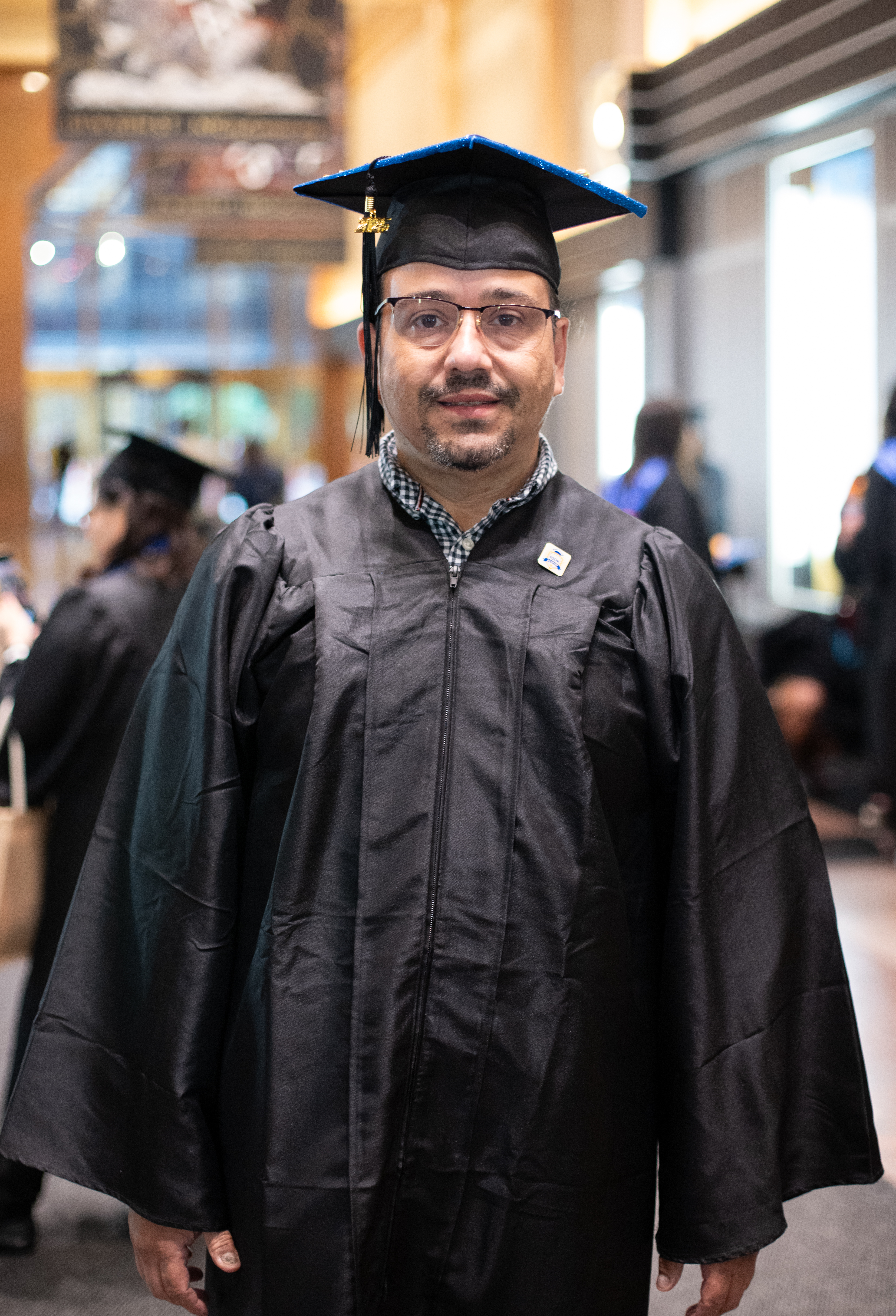 Freddy E. at commencement in New York City.