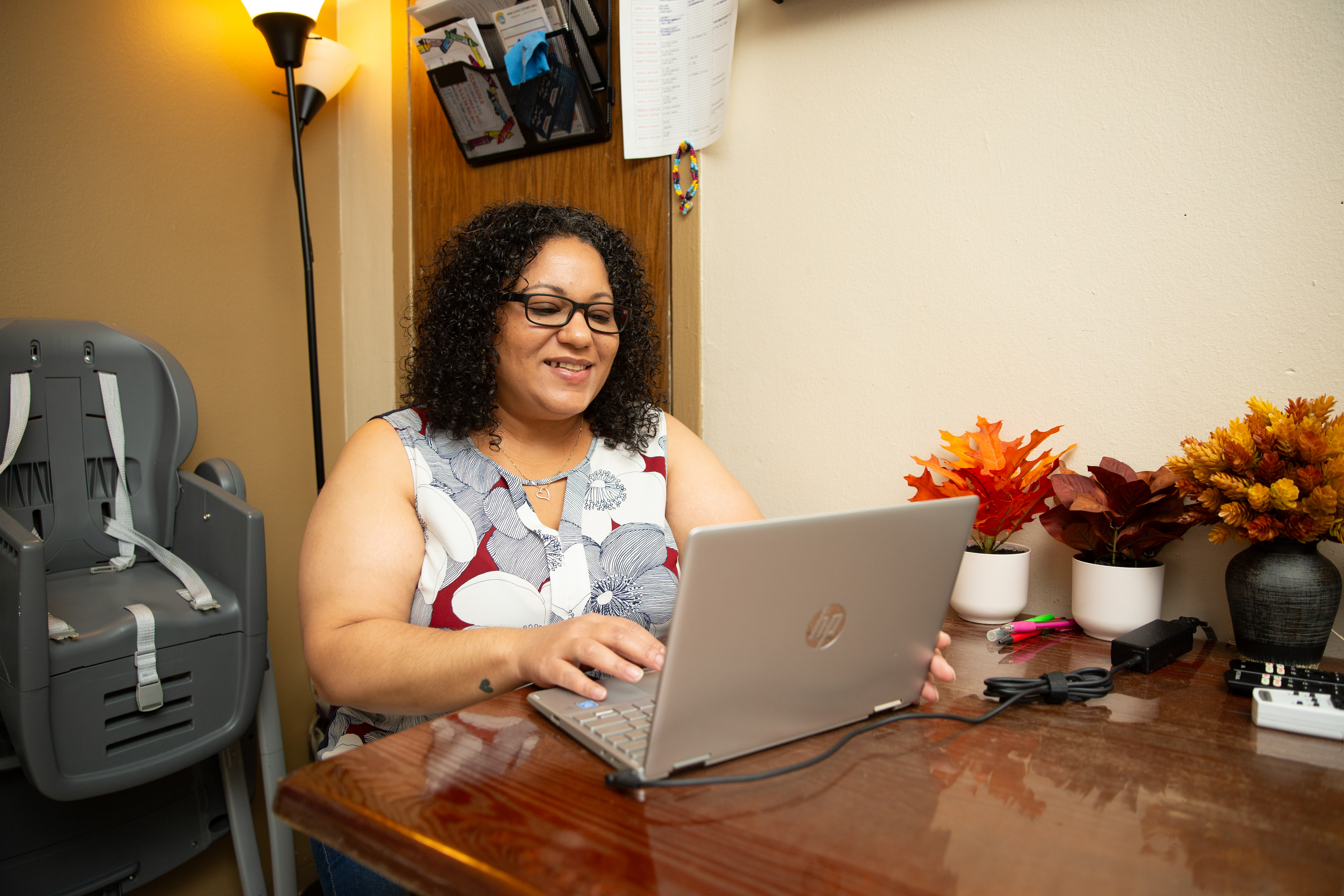Woman has a virtual discussion on a laptop.