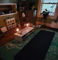 photo of room with two candles in it