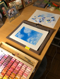 photo of a painting of clouds