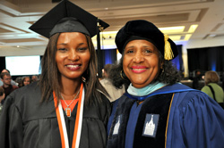Student speaker Ruth Njoroge-Vondran and SUNY Trustee Eunice Lewin share smiles after graduation.