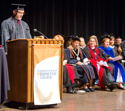 A veteran of the U.S. Armed Forces address the Central New York Center graduation. Images are by Michael J. Okoniewski of the 2013 Central New York Center graduation.