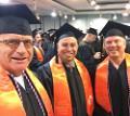 Image of Doug Sherman, left, with two other veterans, who also are members of SALUTE, at the 2017 commencement at Albany.