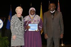 Chancellor Nancy Zimpher, at left, with graduate student Layla Abdullah-Poulos ’10, a 2016 Chancellor’s Award for Student Excellence recipient, and SUNY Empire State College Provost Alfred Ntoko at the presentation ceremony, which was held in Albany. Photo/SUNY