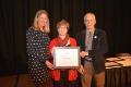 President Merodie Hancock and Alec Meiklejohn presented Joan Johnsen with the 2016 Empire State College Foundation for Excellence Award in Professional Service at the All College Conference. Meiklejohn the 2015 award recipient.